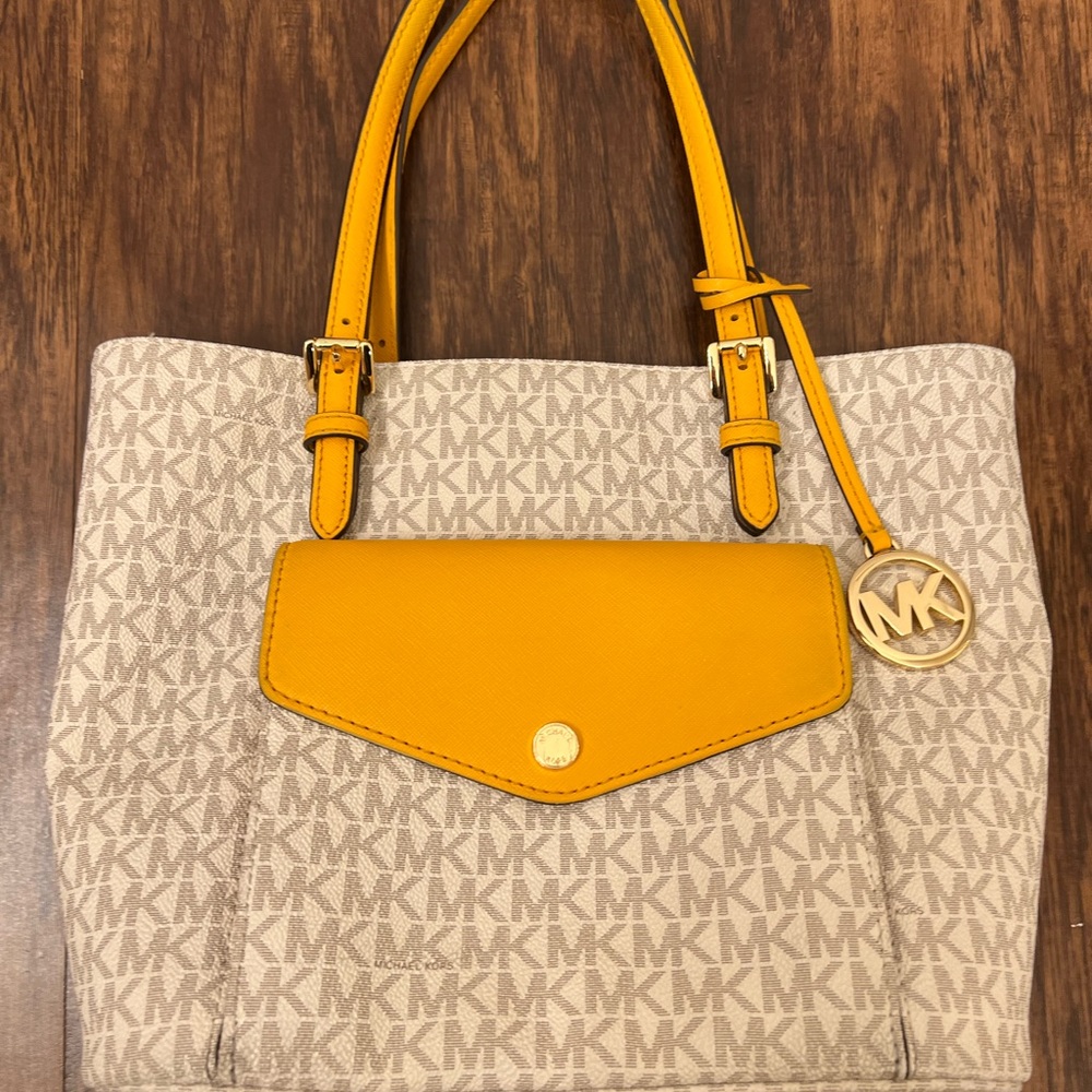 Used great condition MK purse. Yellow/mustard and ivory color. Medium sized. - Picture 2 of 5